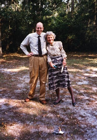 Walter Sedgwick and Louise Humphrey at the burning of the mortgage note for Hanna Hammock, 1997.