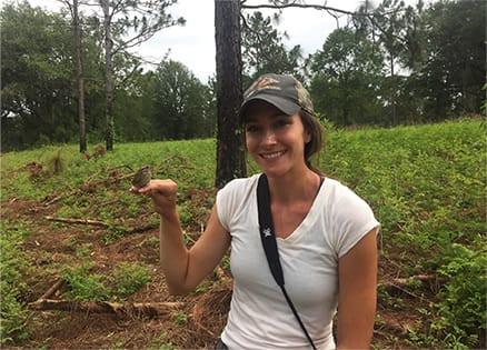 Intern holding bird