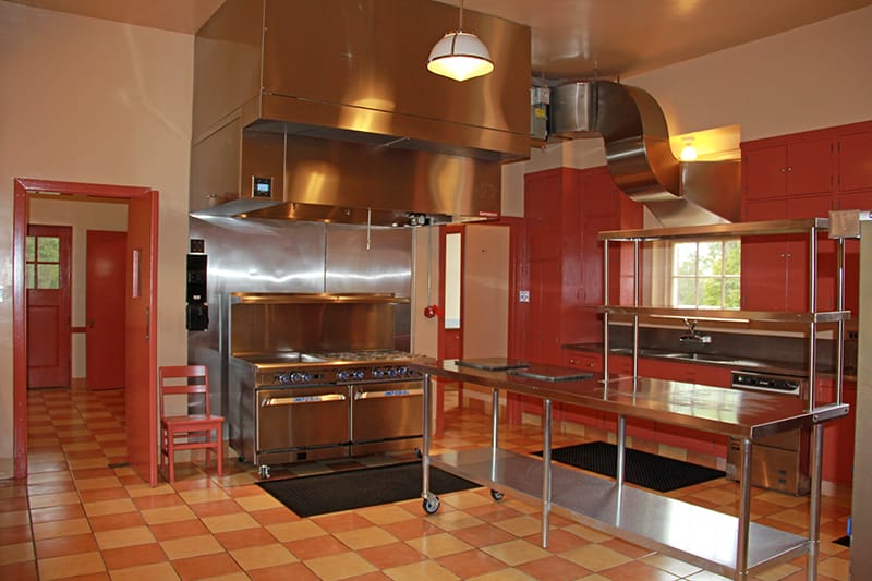 Tall Timbers hired r.e.Walsh Engineering to design a new kitchen exhaust system. The ductwork flows out of a kitchen window without marring the exterior of the building, as the old system did. Dr. George Simmons donated commercial appliances for the kitchen. The kitchen was painted in its original color scheme, the countertops were restored, and the cabinets were repaired.