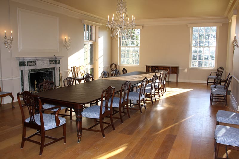 According to the IFACS paint study, the dining room had been coated with a rainbow of paint throughout the history of the Dixie House and has now been restored to its original neutral colors. The more muted tones highlighted the elegant trim, artwork, and furniture the Livingstons placed in the room.