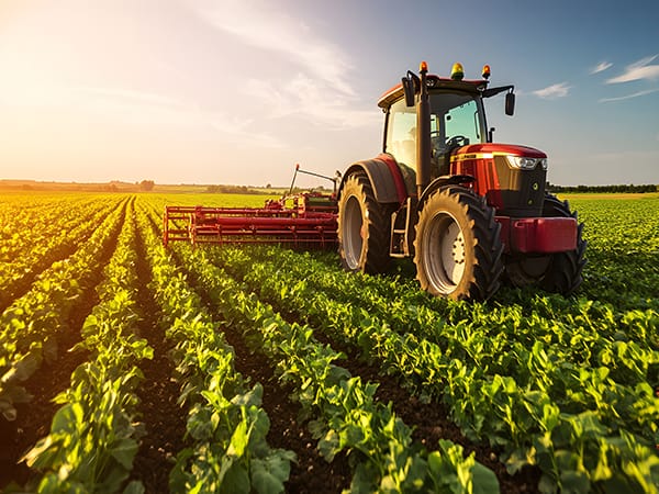 A tractor in an agricultural field, representing the core of far